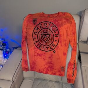 Bought From The Buckle "American Fighter Vibrant Orange Long Sleeve Tee"